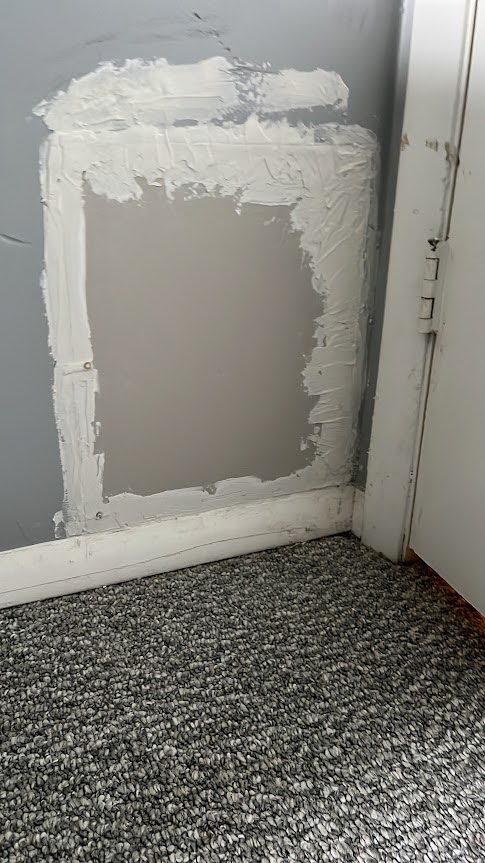 Drywall before repair